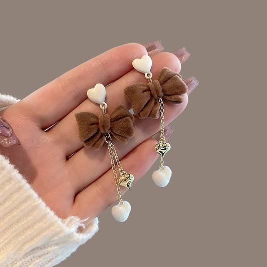Autumn and winter new earrings bow earrings women's velvet milk tea color high-end sense niche design net red temperament earrings
