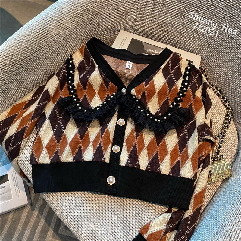 Design sense niche small fragrant style knitted suit women's spring 2023 new retro foreign style skirt two-piece suit