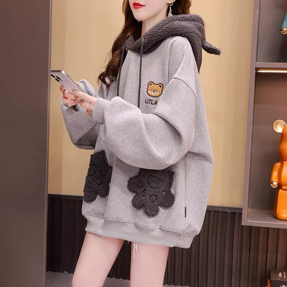 Fleece and thickened hooded sweater women's 2022 new autumn and winter hot style fashion western style age-reducing loose design coat