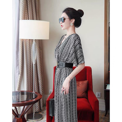 2022 new women's summer temperament jumpsuit goddess fan high-end printing waist loose wide-leg pants ladies jumpsuit