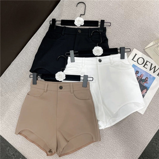 2022 summer new American sexy hot girl Western style all-match self-cultivation thin irregular high waist solid color hot pants women 1610