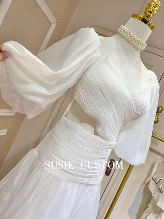 High-custom French-style off-the-shoulder elastic large puff sleeves with chest pads pleated hollowed-out slim fit stitching lotus leaf fishtail skirt