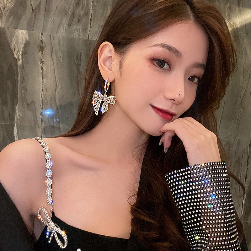 Super fairy earrings high-end sense light luxury 2021 new trendy small earrings exquisite bow earrings exaggerated earrings