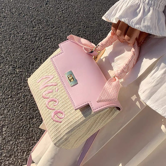 High-quality straw woven bag female summer 2022 new niche design vegetable basket messenger bag woven hand-held small square bag