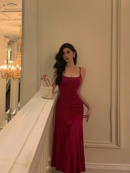 Sexy rose red suspender dress summer women's white temperament sweet and spicy style with self-cultivation bag hip over the knee long skirt 9486