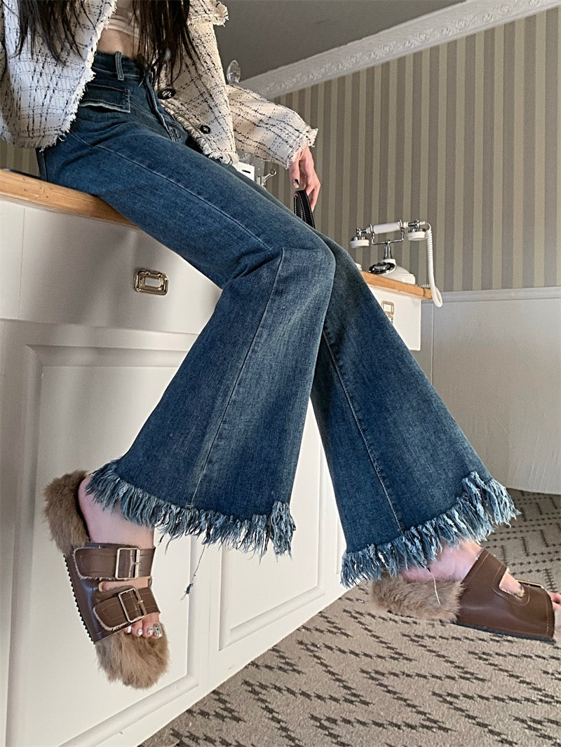 Raw edge retro fringe jeans women's spring and autumn self-cultivation and thin design sense niche high waist micro flared pants trousers