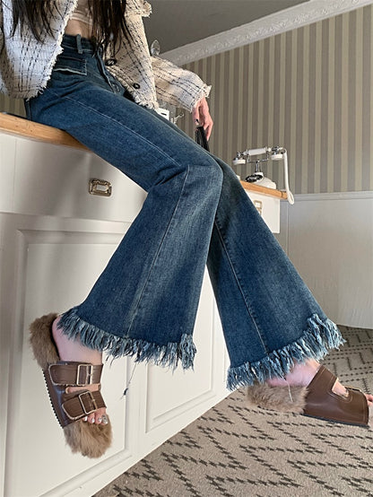 Raw edge retro fringe jeans women's spring and autumn self-cultivation and thin design sense niche high waist micro flared pants trousers