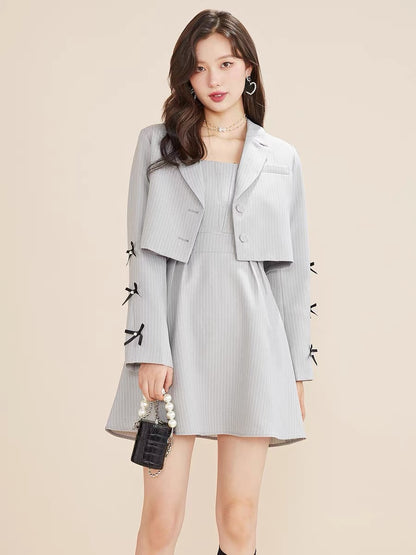 Fantu 2022 autumn new style bow decoration fashion suit women's short long-sleeved zipper suspender skirt two-piece set