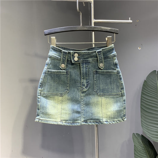 Retro denim skirt women's Hong Kong style hot girl hakama 2023 spring new high waist slimming a-line bag hip skirt