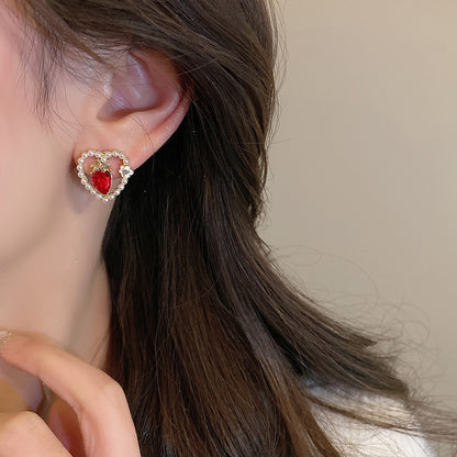 New Year's Red Hollow Heart Stud Earrings Women's Unique Design High-end Earrings Niche Festive Silver Needle Explosive Earrings