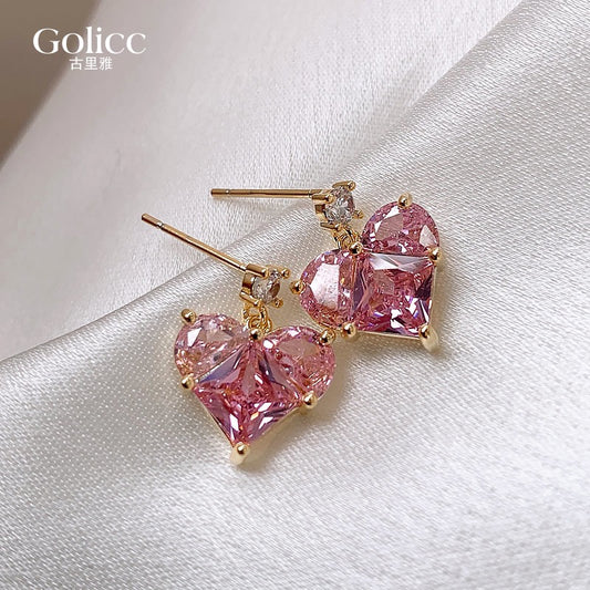 925 silver needle pink love earrings female Korean version super flash temperament simple peach heart earrings light luxury design sense