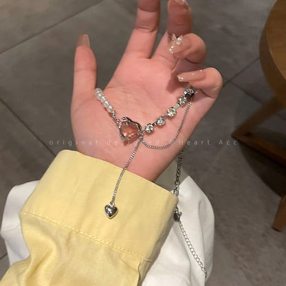 Love pearl stitching necklace female ins high-end design sense niche light luxury necklace titanium steel clavicle chain that does not fade