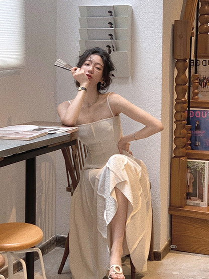 White sling dress women's summer 2023 new tea break French temperament waist slimming long skirt