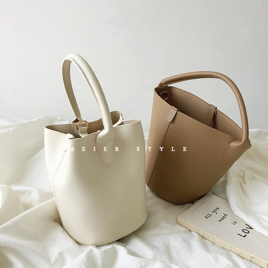 Korean ins simple retro bucket bag fashion all-match handbag shoulder Messenger bag mother bag texture female bag