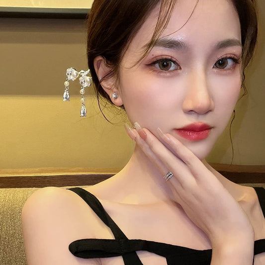 Innocent flower ~ new Chinese style iris lily of the valley hairpin children simple modern pearl flower tassel hairpin