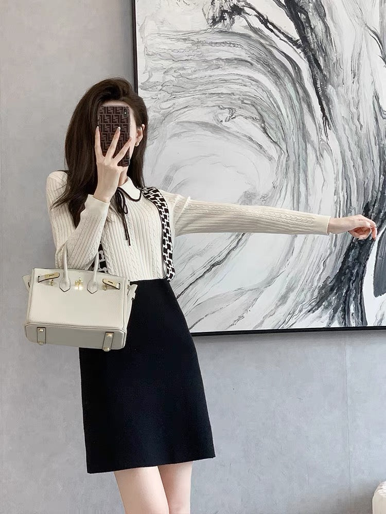 Autumn and winter high-end black knitted dress 2022 new women's French high-end fake two-piece small skirt