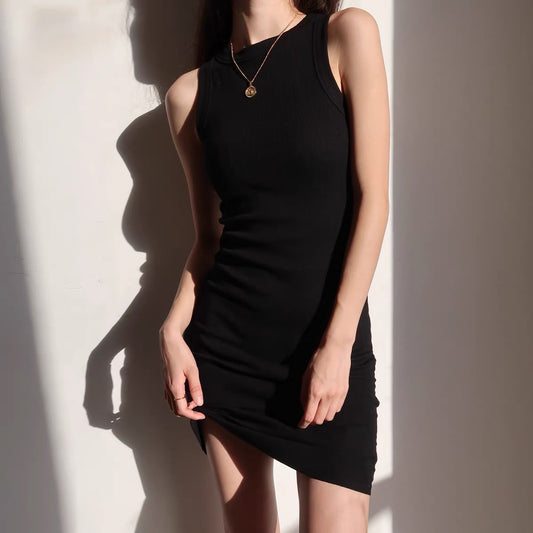 European and American solid color slim slim suspender skirt hot girl bag hip tight skirt sexy short skirt pleated bow word vest skirt
