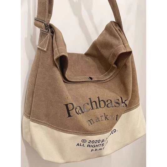 Large-capacity canvas bag women's 2022 new trendy retro lazy wind one-shoulder tote bag students attend class Messenger bag