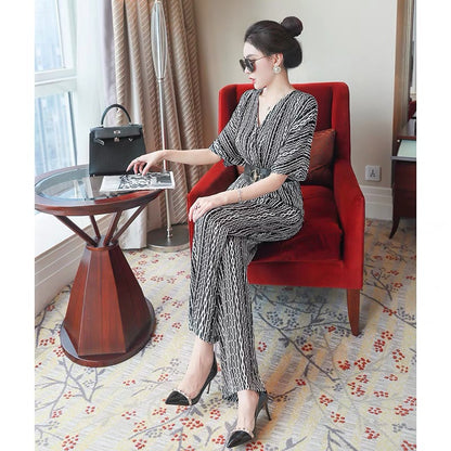 2022 new women's summer temperament jumpsuit goddess fan high-end printing waist loose wide-leg pants ladies jumpsuit