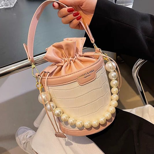 High-quality pearl handbag women's 2022 new fashion all-match bucket bag ins niche explosion style messenger bag