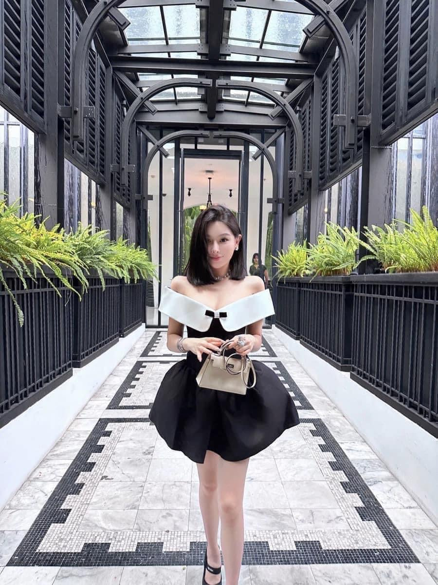 Woppei early spring new girly style niche design sense big V-neck shushuton* black strapless dress