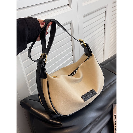 High-end large-capacity bag women's 2022 new trendy fashion niche one-shoulder dumpling bag all-match commuting Messenger bag
