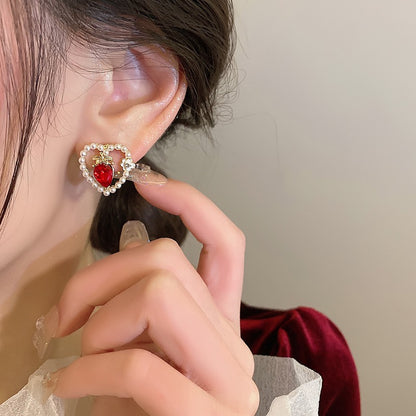 New Year's Red Hollow Heart Stud Earrings Women's Unique Design High-end Earrings Niche Festive Silver Needle Explosive Earrings
