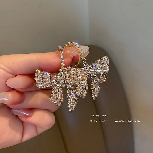 Super fairy earrings high-end sense light luxury 2021 new trendy small earrings exquisite bow earrings exaggerated earrings